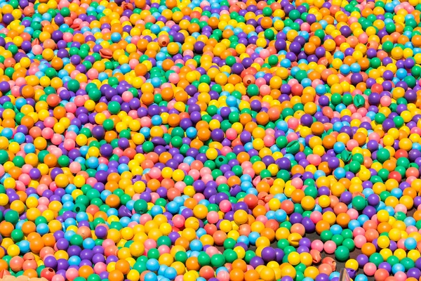 Bolas de plástico colorido textura fondo — Foto de Stock