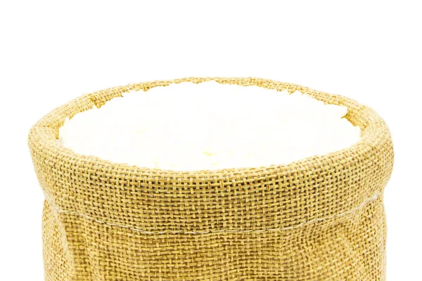 Thaise rauwe rijst op zak geïsoleerd witte achtergrond — Stockfoto