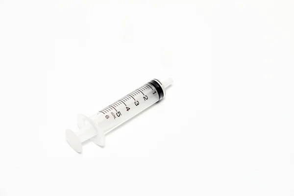 Injekciós fecskendő, a gyógyszertár elszigetelt fehér background — Stock Fotó