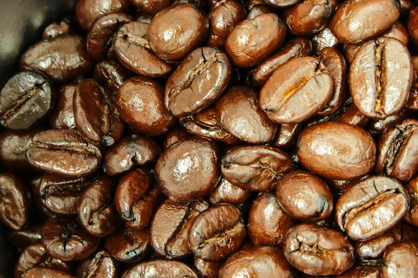 Коричневі кавові зерна крупним планом старовинна текстура фону — стокове фото