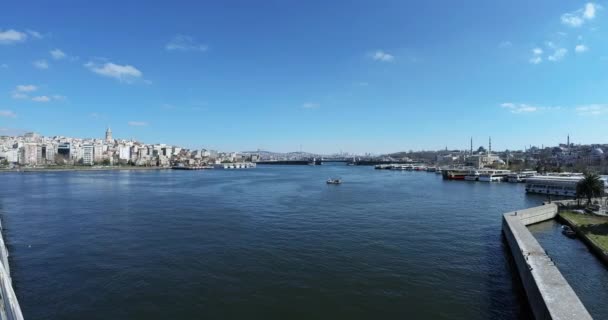 Pan from Galata Bridge to Golden Horn Metro Bridge in Istanbul - Ultra wide, DCI 4K — Stock Video