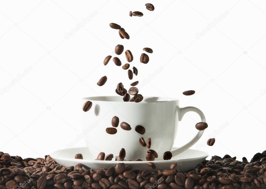 Cup of coffee with roasted beans