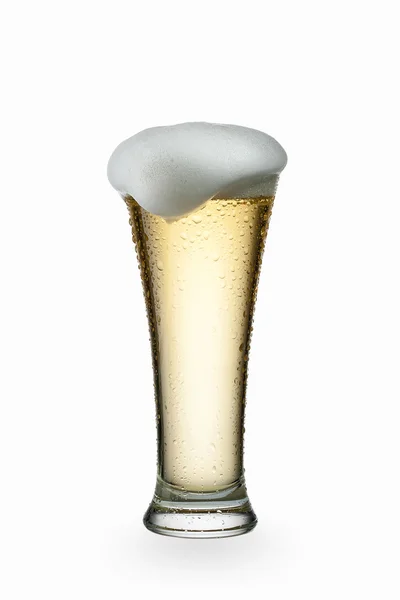 Light beer into glass isolated on white — Stock Photo, Image