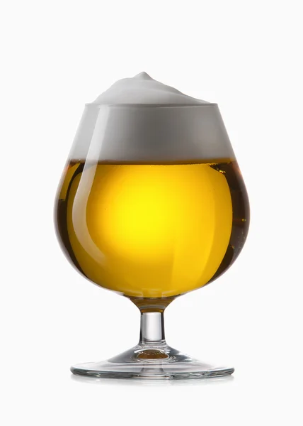 Light beer into glass isolated on white — Stock Photo, Image
