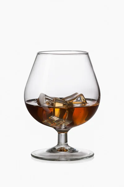 Whiskey with ice cubes in glass — Stock Photo, Image