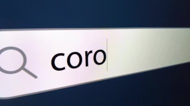 Sonunda Coronavirus arama çubuğunda bir imleç, bilgisayar monitörü ve kamera yakınlaştırması etkisi ile bir soru işareti yazılır.
