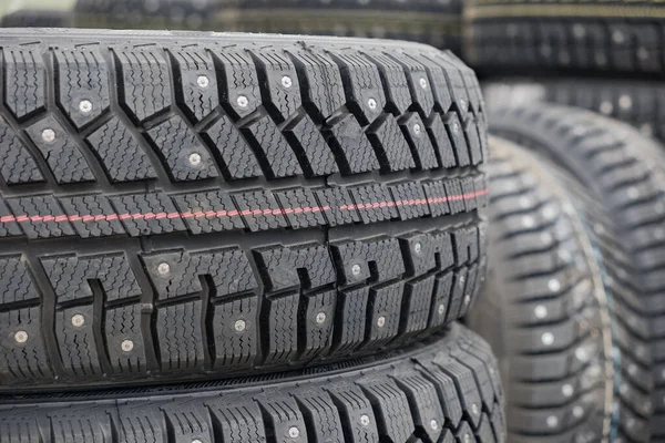 Take care of your safety and the safety of your family with studded winter tires, for snowy climates and regions with cold winters. — Stock Image Take Care Your Safety Safety Your Family Studded Winter Tires Stock Photo