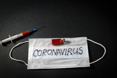 Üzerinde kan olan bir şırınga ve yeni bir NCOV için yapılan kan testi neticesinde oluşan ampul - 2020 Coronavirus, Çin 'in Wuhan şehrinden kaynaklanıyor.