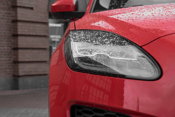 Modern luxury red premium car closeup, copy space, banner, background. The concept of expensive premium, sports SUVs.