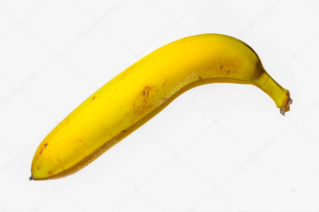 ripe single yellow banana isolated on white background
