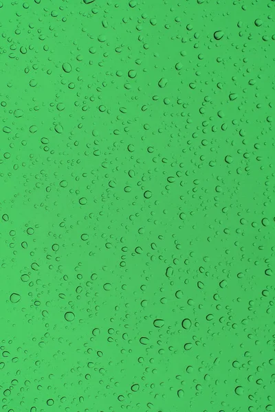 Konzeptioneller Hintergrund Wassertropfen Auf Grünem Glas — Stockfoto