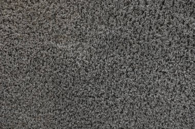 Gri-kahverengi halının arka planı, kabartmalı arka plan.