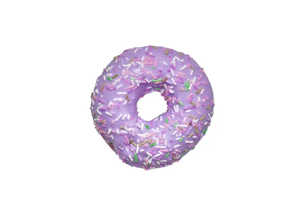 紫色的甜甜圈装饰着五彩缤纷的洒落在白色背景上 平躺在床上顶部视图 — 图库照片
