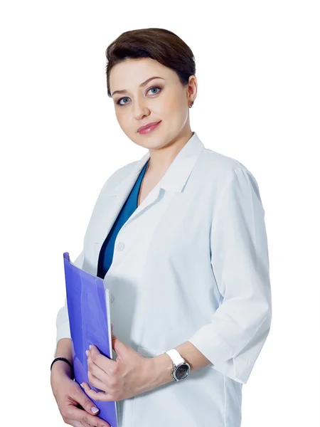 白色背景上孤立的年轻医生女人的画像 图库图片