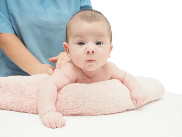 Doctor massage small caucasian baby isolated — Stock Photo, Image