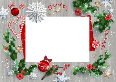 Holly dalları ve şenlikli dekorasyonlar