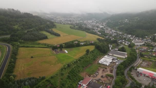 Adenau Germany, Race track air drone view in the Eifel в похмурий день. — стокове відео