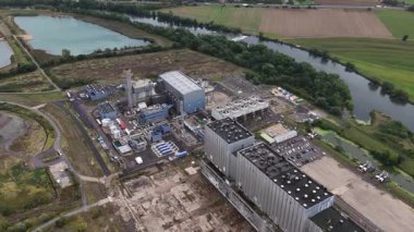 Natural gas power plant production unit of 440MW. Blenod, France. Aerial drone video of facility overview.