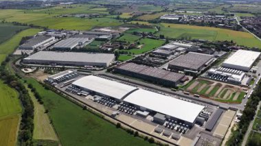 Aerial drone video of a data center, Big Data, AI, and Cloud Services infrastructure in Milan, Italy.