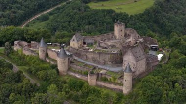 Bourscheid Castle is a medieval fortress located approximately two kilometers from the village of Bourscheid , in the north of the Grand Duchy of Luxembourg.