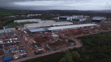 erial drone video of the hyperscale Cardiff data center expansion at dusk, emphasizing AI, cloud, and construction.