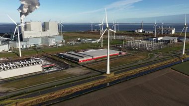 Aerial drone video of the operational EEMSDC1 data center in Eemshaven, Netherlands, fiber optic hub.