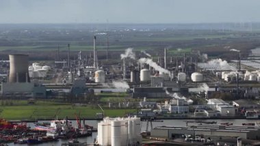 Moerdijk, Province of North Brabant, The Netherlands, November, 17, 2025: A zoomed in close up view of the operational smoke stack and complex industrial installation at the Shell Chemicals Park Moerdijk refinery in the Netherlands. This image