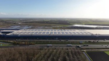 Moerdijk, Province of North Brabant, The Netherlands, November, 17, 2025: Largest contiguous warehouse in the Netherlands DSV Moerdijk and its mega-scale construction and logistics components.