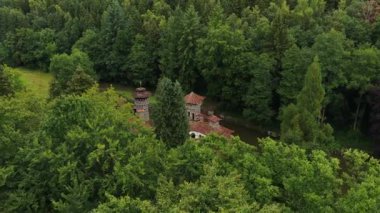 Turrelbach Castle in Mertzig, Luxembourg. Aerial drone footage in summertime
