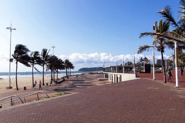 Bank of Clouds over Sea with Paved Promenade in Foreground — Stock Photo, Image