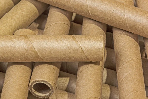Scattered Collection of Cardboard Packaging Tubes Royalty Free Stock Photos