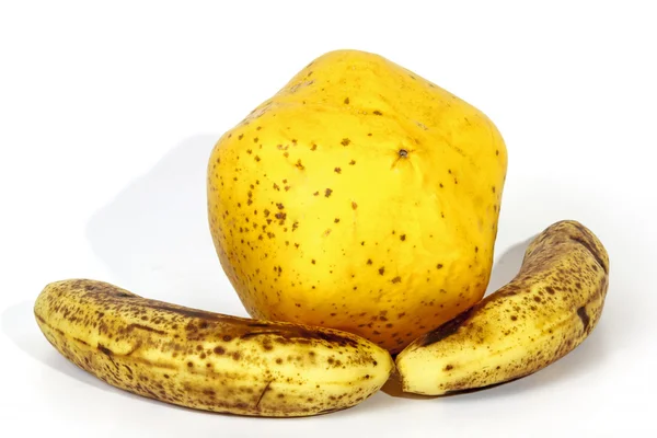 Yellow Paw Paw with Two Ripe Speckled Bananas — Stock Photo, Image