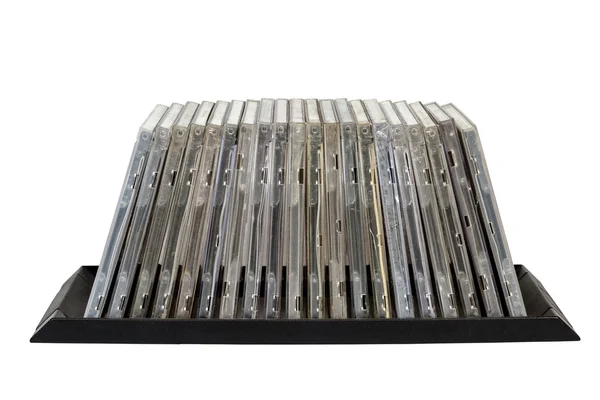 Vista frontal de los antiguos soportes de disco compacto Grungy apilados — Foto de Stock