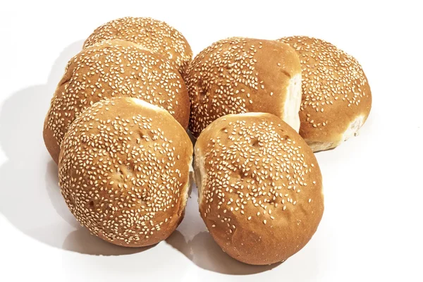 Six Hamburger Buns Covered with Sesame Seeds — Stock Photo, Image