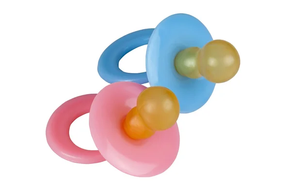 Pair of Baby Pacifiers in Blue and Pink — Stock Photo, Image