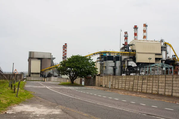 Roadway Running Alongside Industrial Production Mill — Stock Photo, Image