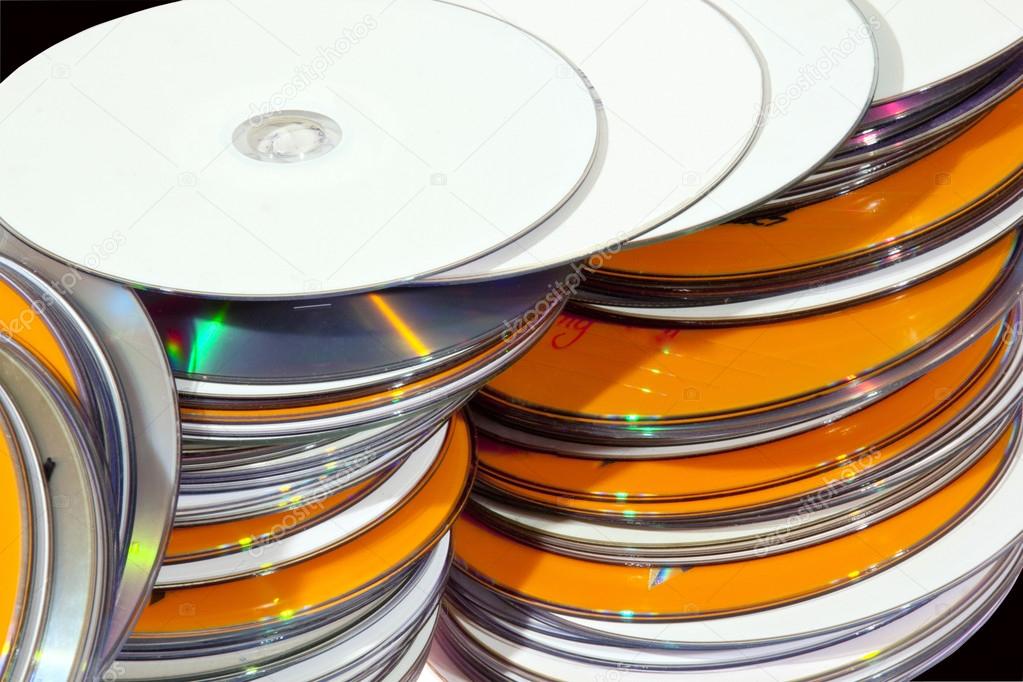 Closeup View of Stacked Colorful Compact Disks