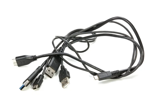 Geïsoleerd beeld van drie zwarte verweven USB-kabels — Stockfoto