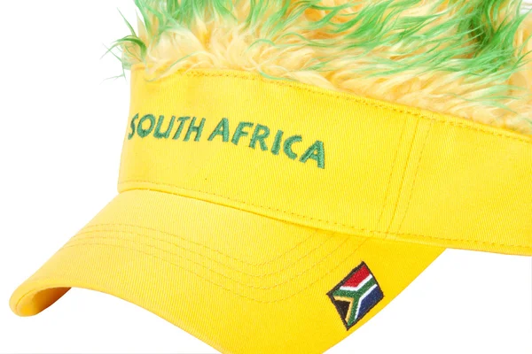 South African Peak Cap with Flag and Artificial Hair — Stock Photo, Image