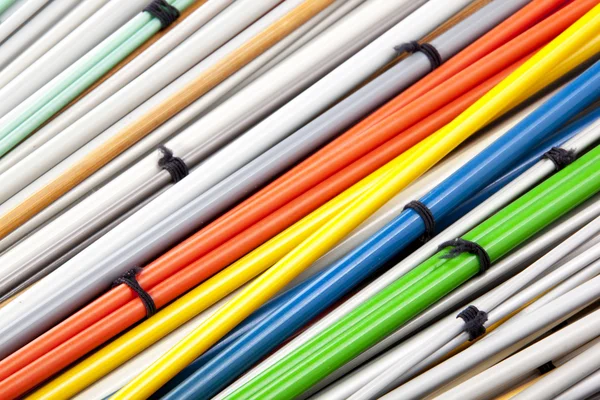Closeup Colorful Sets of Paired Knitting Needles — Stock Photo, Image
