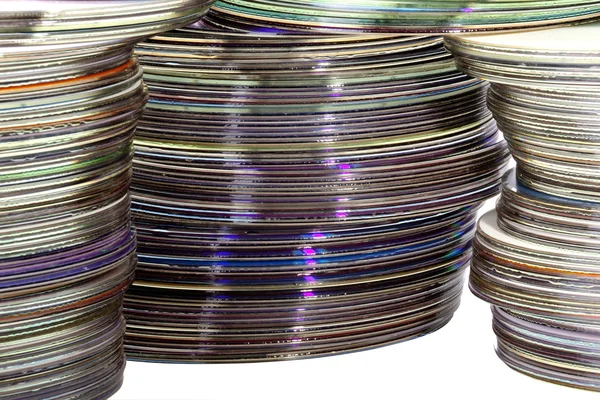 Tre högar av färgade blank CD-skivor — Stockfoto