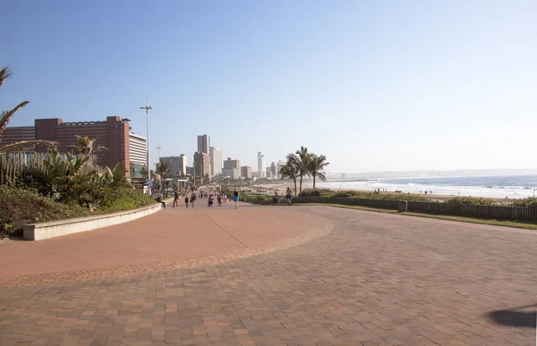 Early Morning people on Beach Front Promenade — Stock Photo, Image