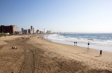People and Surfers on Addington Beach in Durban