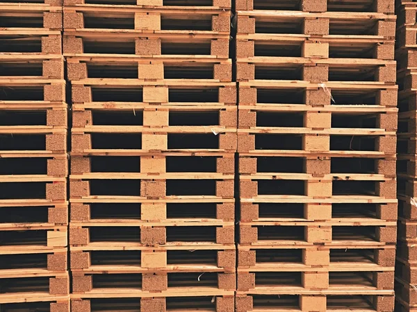 Stock of new wooden euro pallets at transportation company. — Stock Photo, Image