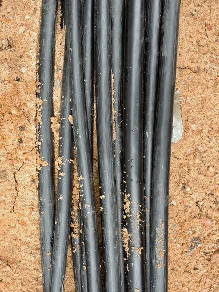 Lines of metallic and fiber optic cables, construction of communication optical network connection — Stock Image Lines of metallic and fiber optic cables, construction of communication optical network connection Stock Image