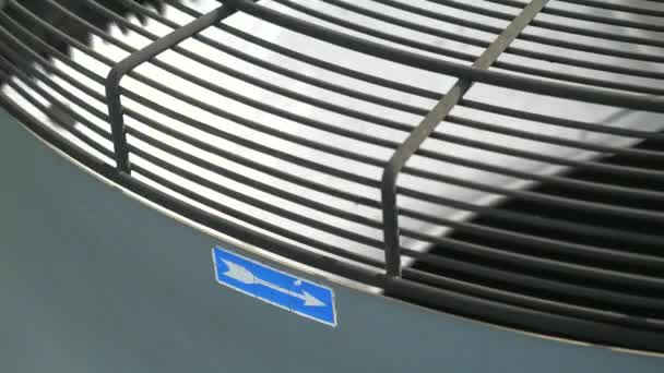 Industrial cooler propeller hidden under safety bar. Close up of an electric Industrial Fan blade. — Stock Footage Industrial Cooler Propeller Hidden Safety Bar Close Electric Industrial Fan Royalty Free Stock Video
