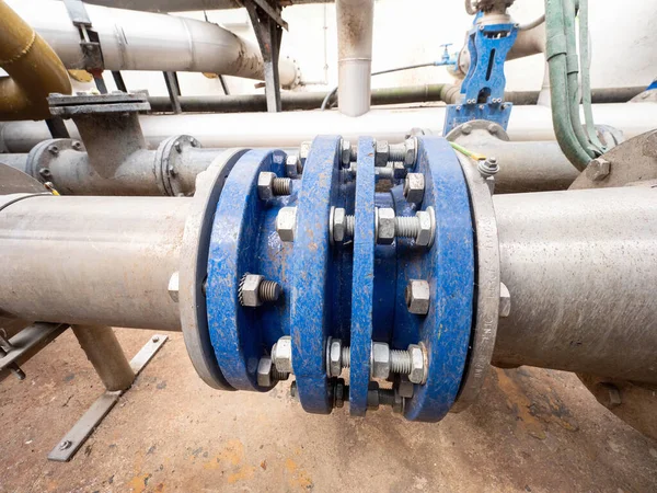 Pipeline with joint member. Underground concrete shafts with Gate valve and  armature branch. The dring water service and Water network maintenance.