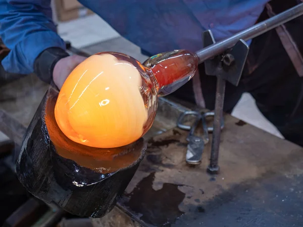 Glassblower Using Wet Wooden Form Shaping Red Melted Glass End — Stock Photo, Image