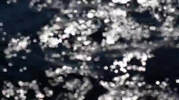 Від Єднані Вогні Блакитні Пилові Розфокусовані Вогні Над Темним Фоном — стокове відео