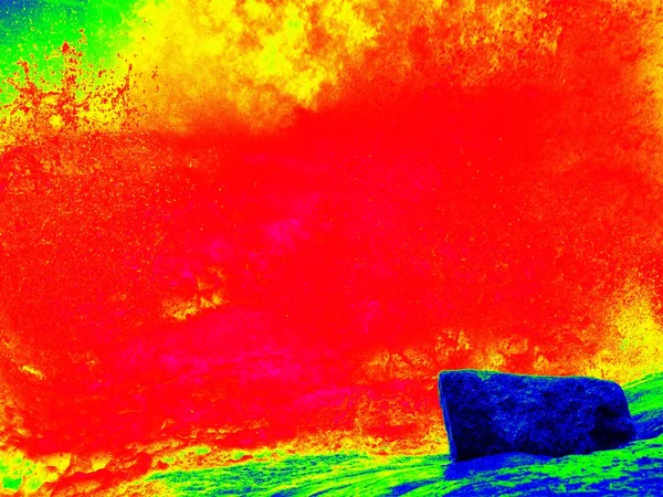 Foamy water of waterfall, looks like hot magma. Cold water of mountain river in infrared photo. Amazing thermography. — Stock Photo, Image